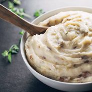 Easiest Garlic Mashed Potatoes - made entirely in the bowl of a slow cooker for easy prep and clean up! And that roasted garlic flavor - YUM.